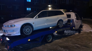 Эвакуация автомобиля зимой